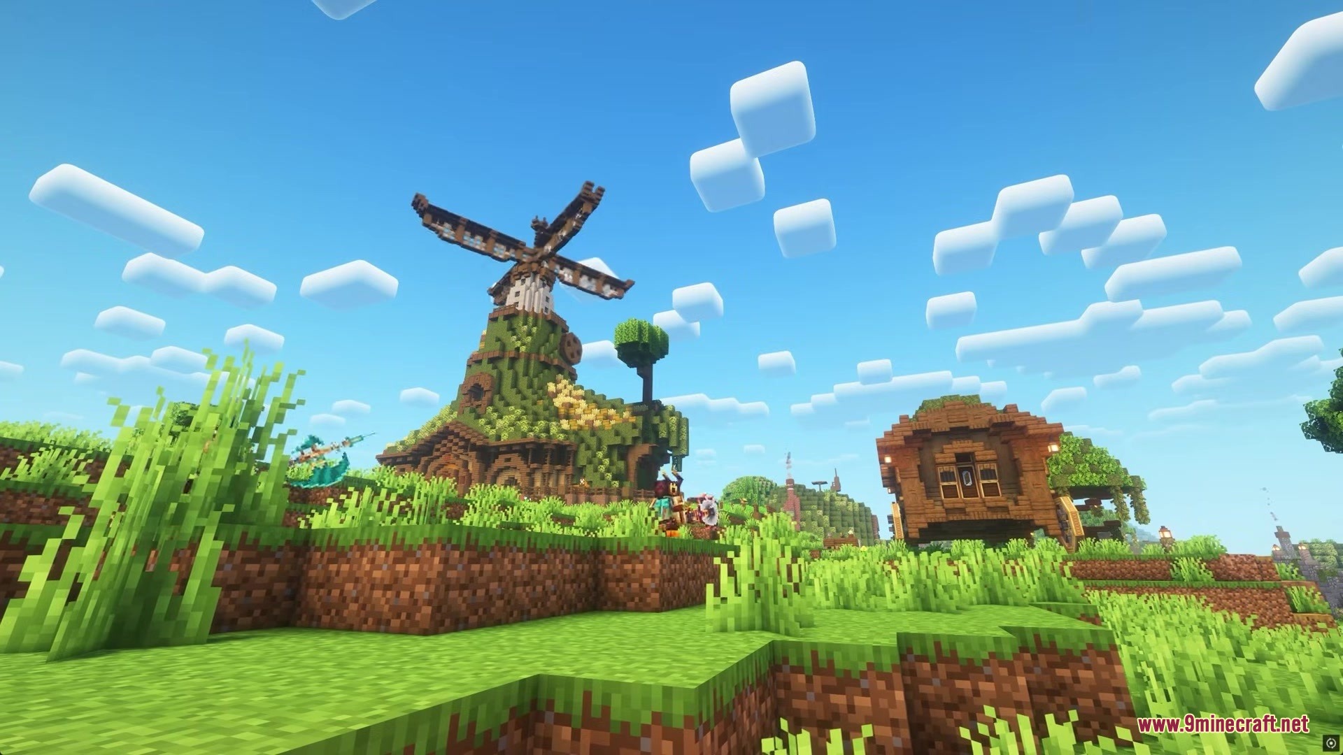 Clockwork by Joo5h Mod Screenshot 5 A player stands near a large windmill and a wooden wagon house