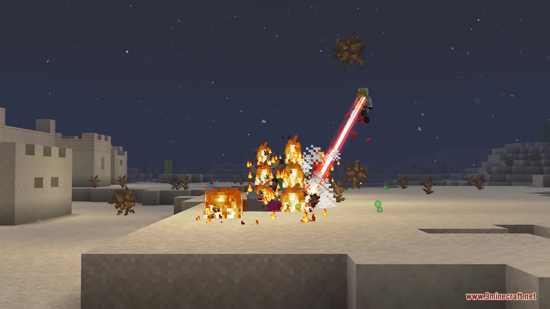 A player character shoots red laser beams from their eyes at burning mobs