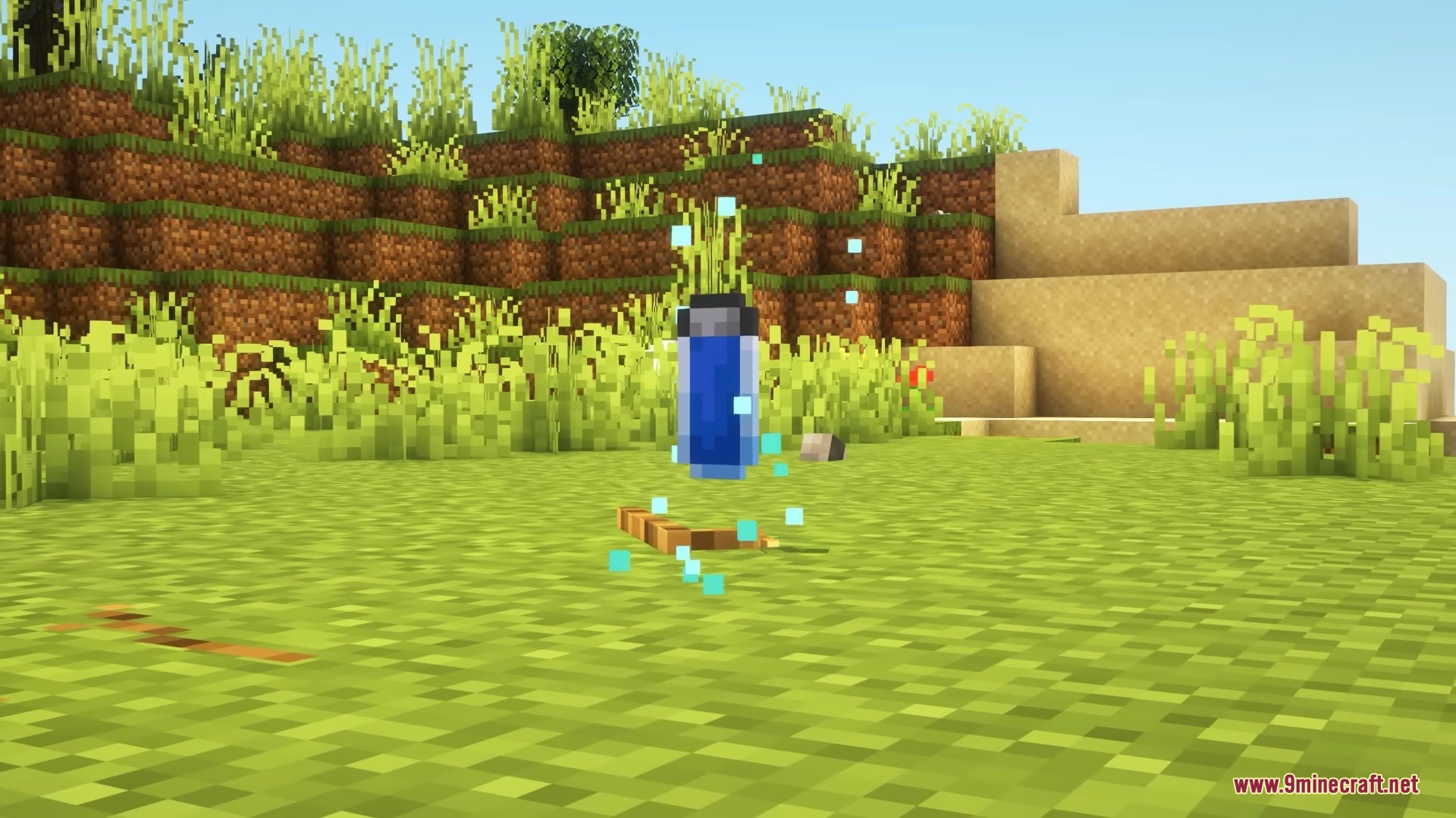 A blue Compound V vial floating above the ground with glowing blue particles