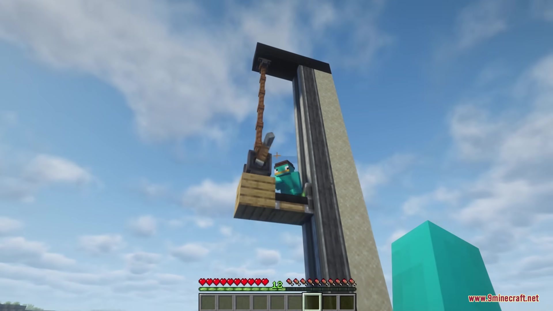 A player stands on a wooden platform sliding along a vertical linear track