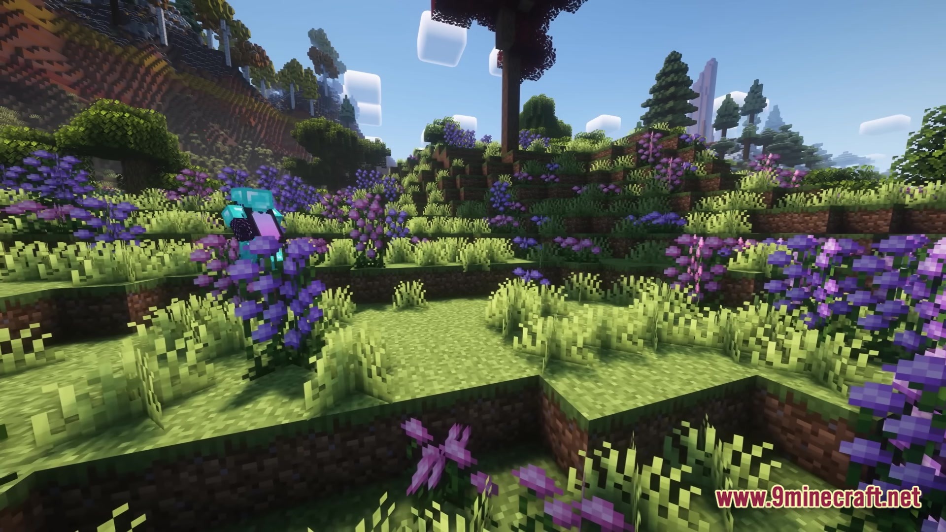 Create Modpack Screenshot 1 A Minecraft player in diamond armor stands in a hilly biome filled with purple flowers and shaders