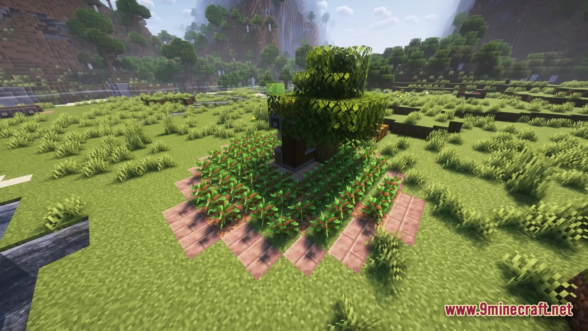 Create Modpack Screenshot 6 A mechanical harvester from the Create mod automates a circular crop farm in a grassy biome