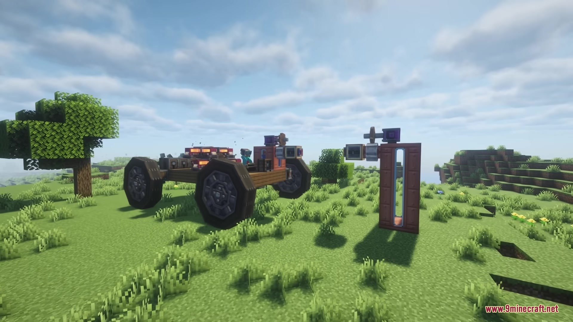 Create Tracks Mod Screenshot 1 A player drives a custom offroad vehicle next to a fuel station