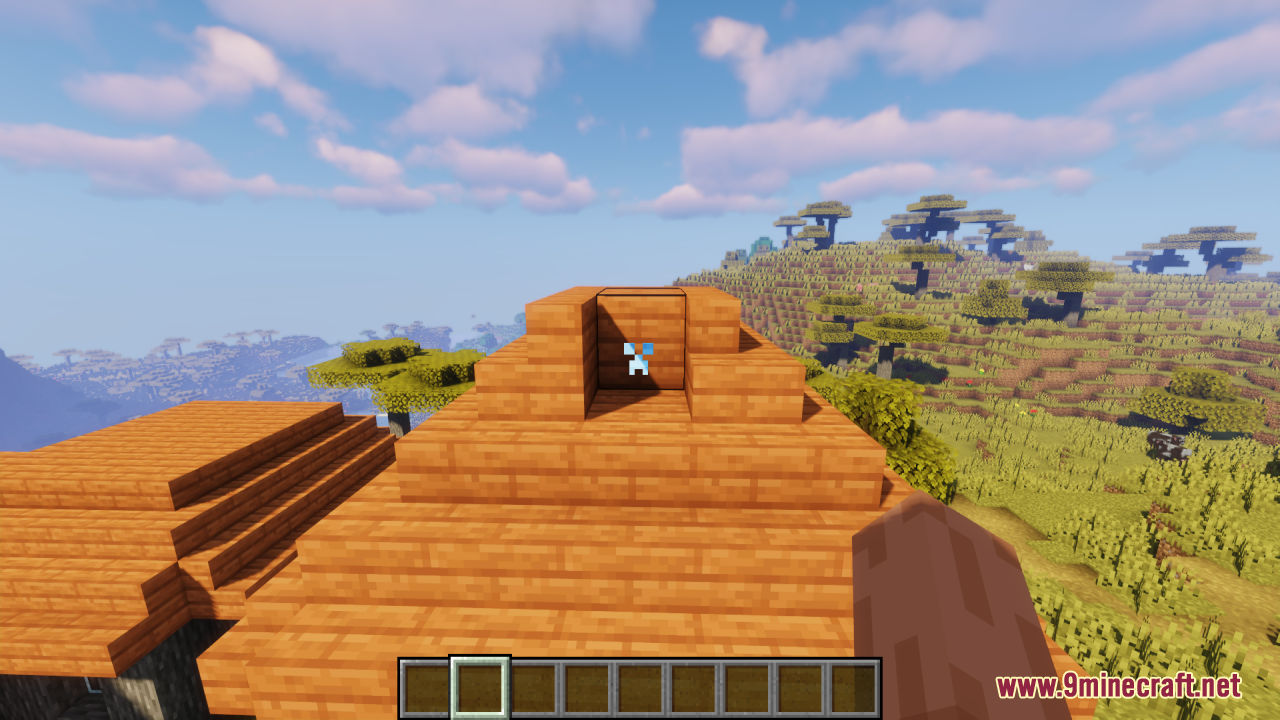 A blue creeper face crosshair aimed at a wooden roof in Minecraft