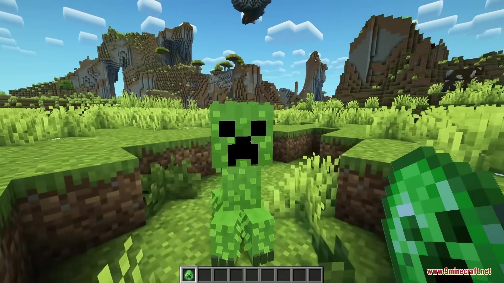 A fluffy creeper from the Minecraft Movie Resource Pack stands in a field
