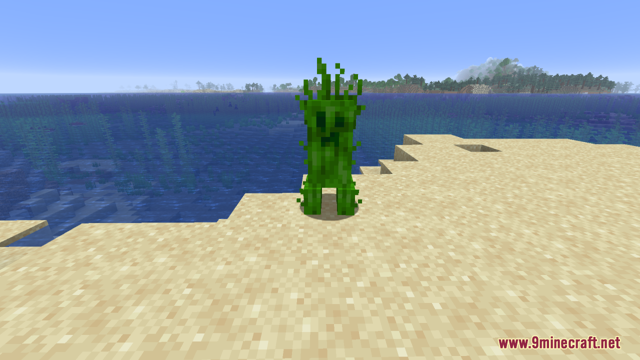 Creepers Refreshed Resource Pack Screenshot 2 A leafy green creeper stands on a beach near the blue ocean water