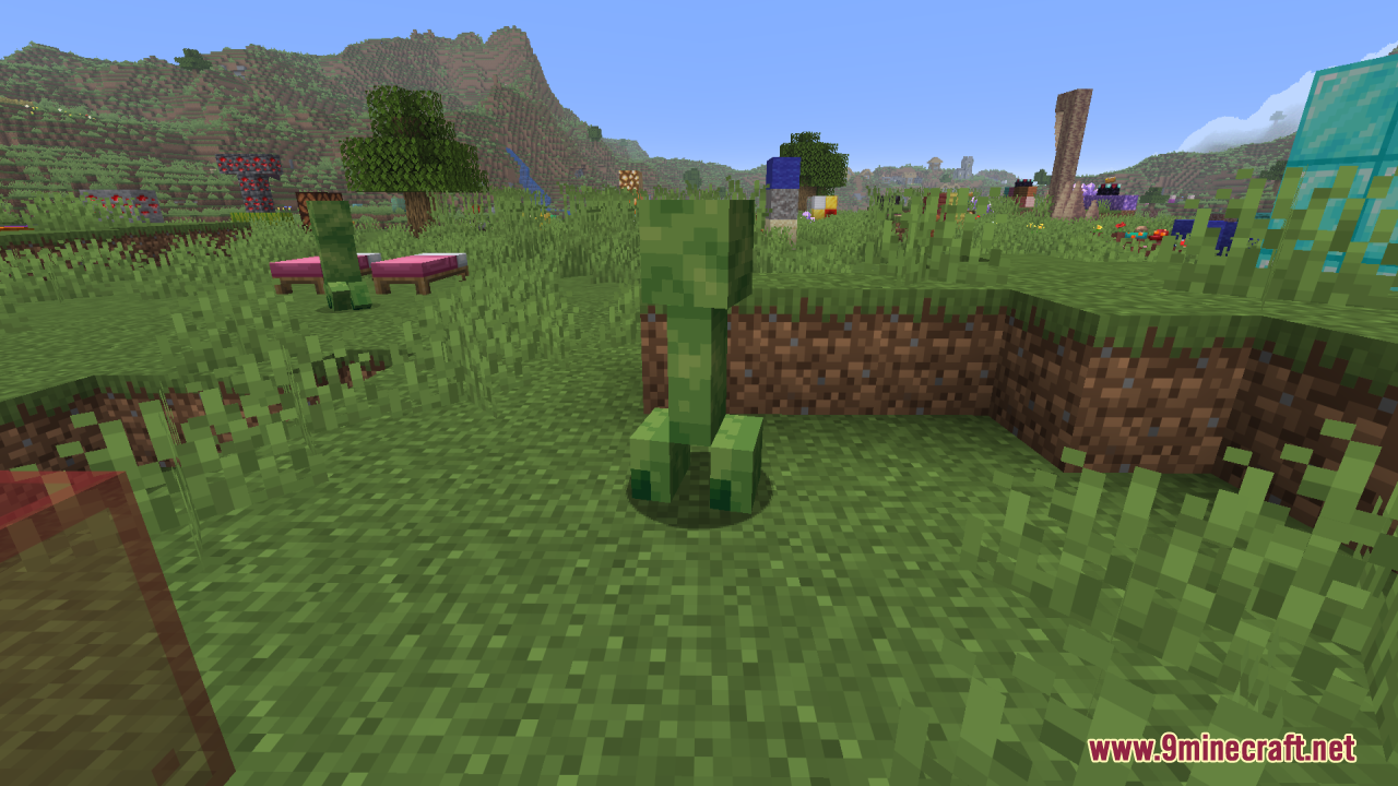 Creepers Refreshed Resource Pack Screenshot 4 A green Creeper stands in a grassy field with pink beds nearby