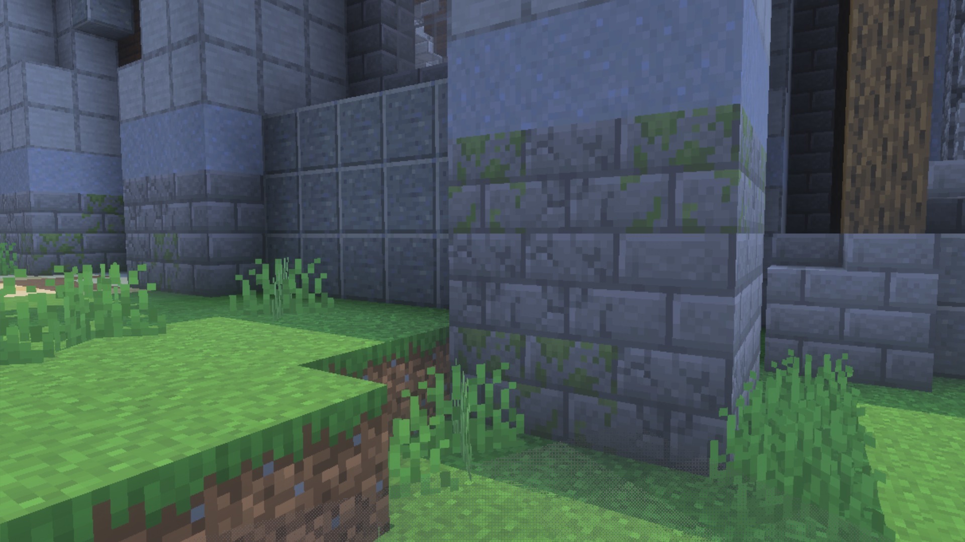 Detailed view of mossy stone bricks and smooth stone blocks in a garden