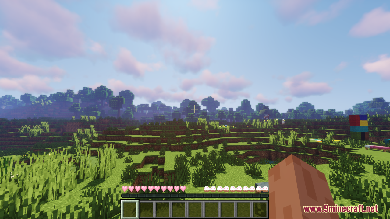Standing in a grassy field displaying cute pink hearts and hunger bars
