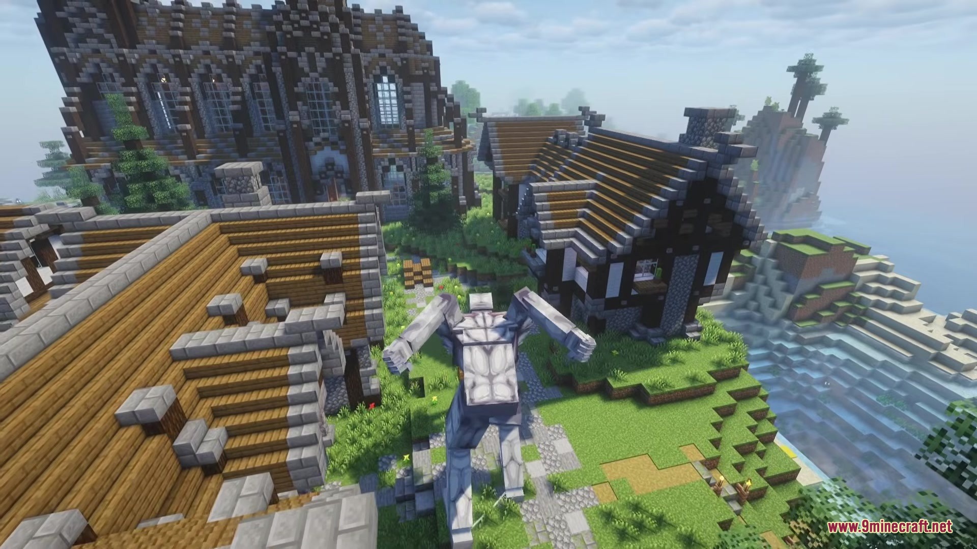 Danny's AOT Mod Screenshot 3 A massive white titan stands among medieval houses in a Minecraft village