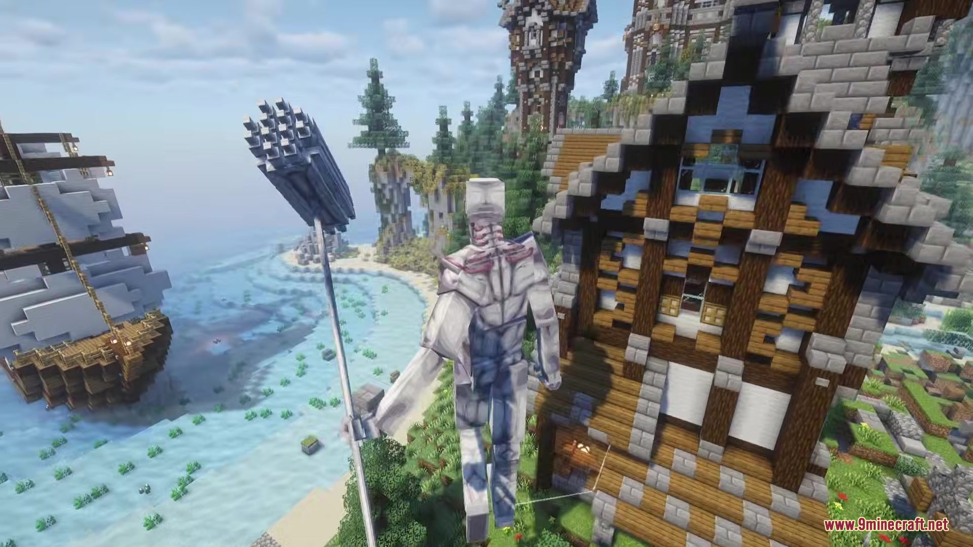 Danny's AOT Mod Screenshot 9 War Hammer Titan stands with its massive hammer near a coastal village