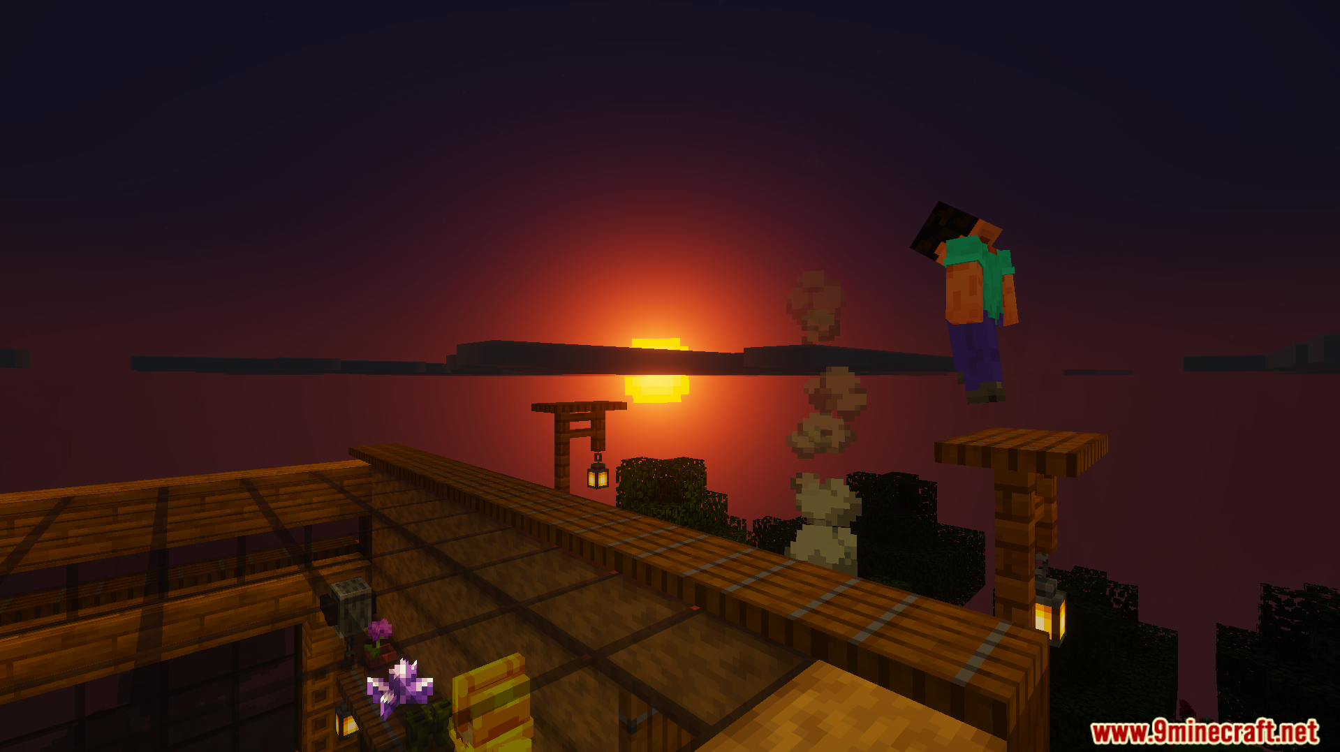 Player character jumping near a wooden building during a dark sunset