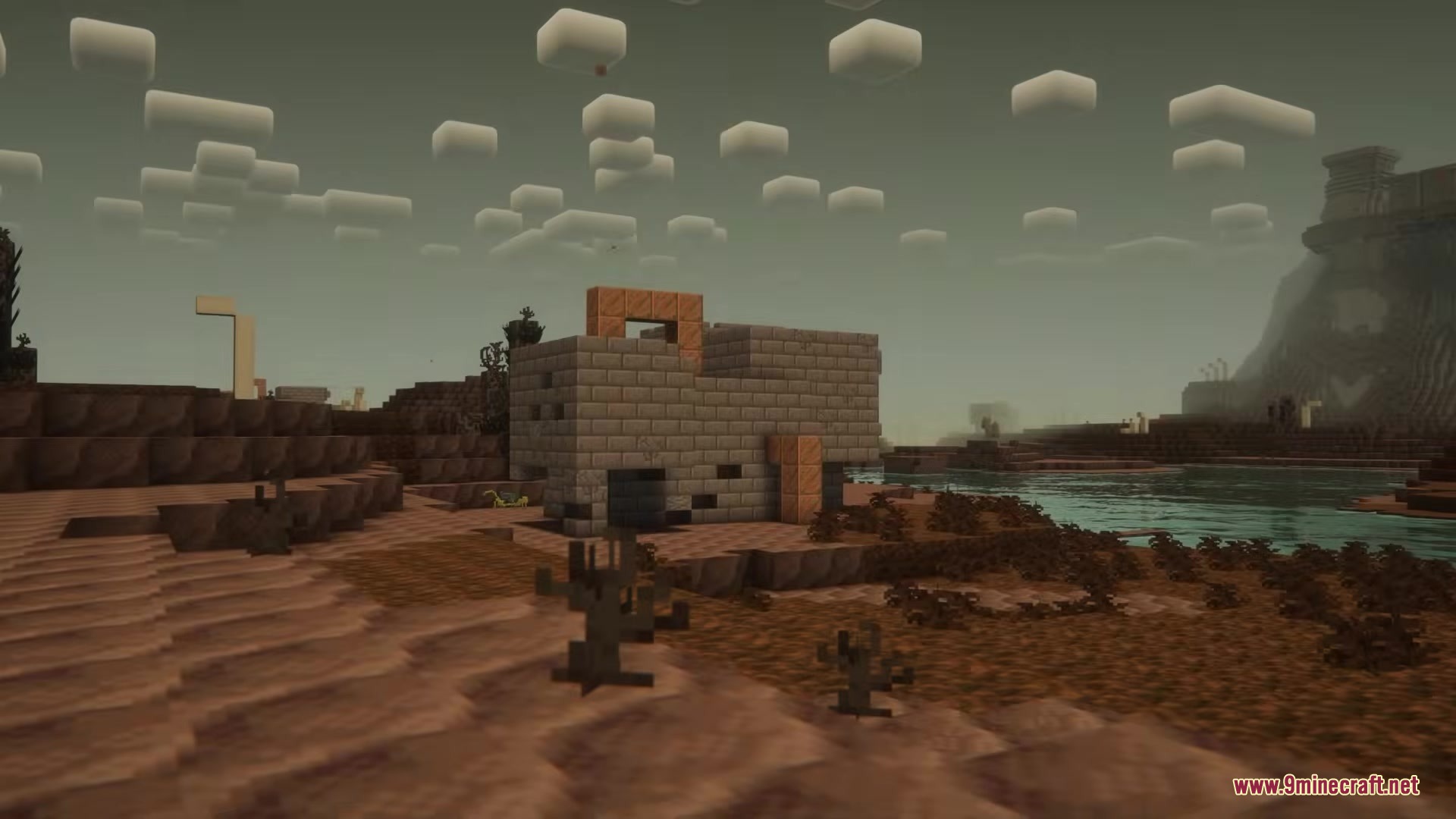 A stone building stands in the radioactive wasteland of Desolate Wastes Mod
