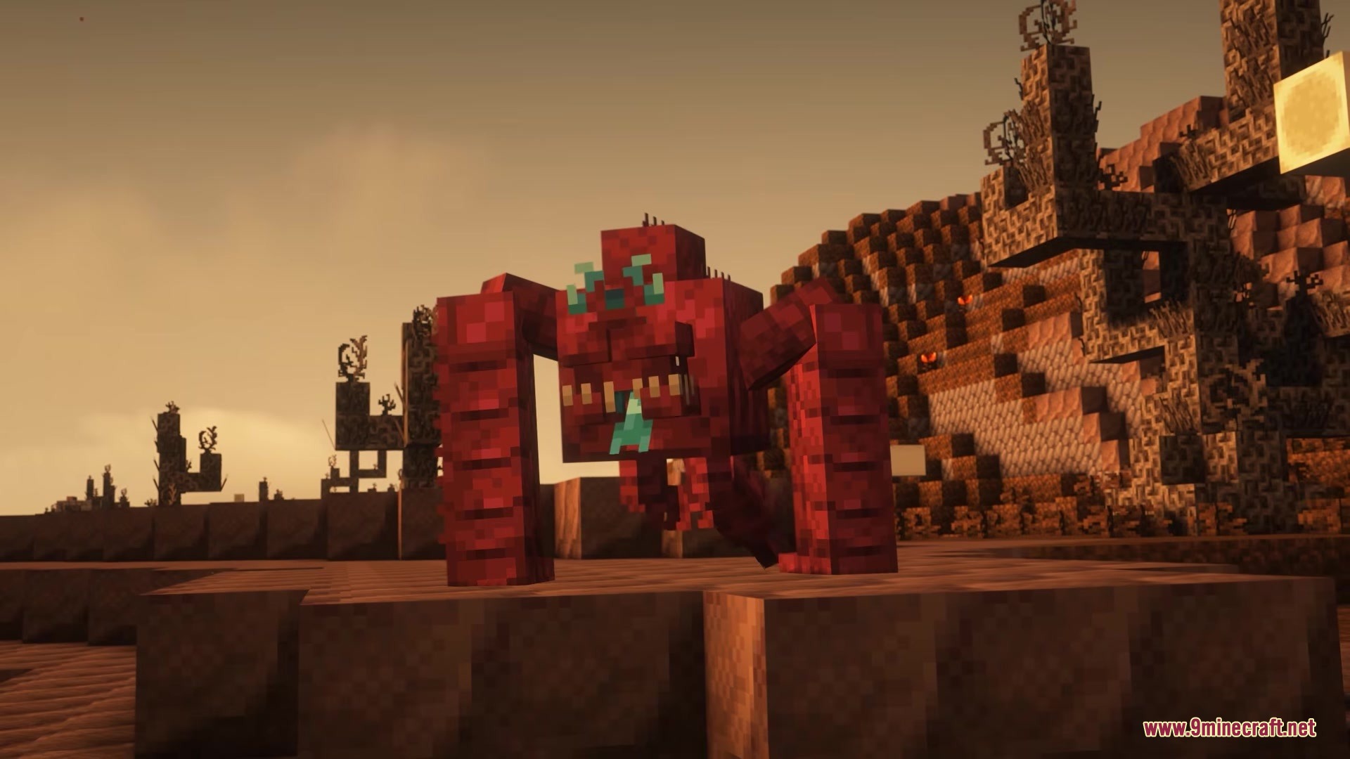 A ferocious red Hunchback mutant prowls through a dusty and barren landscape