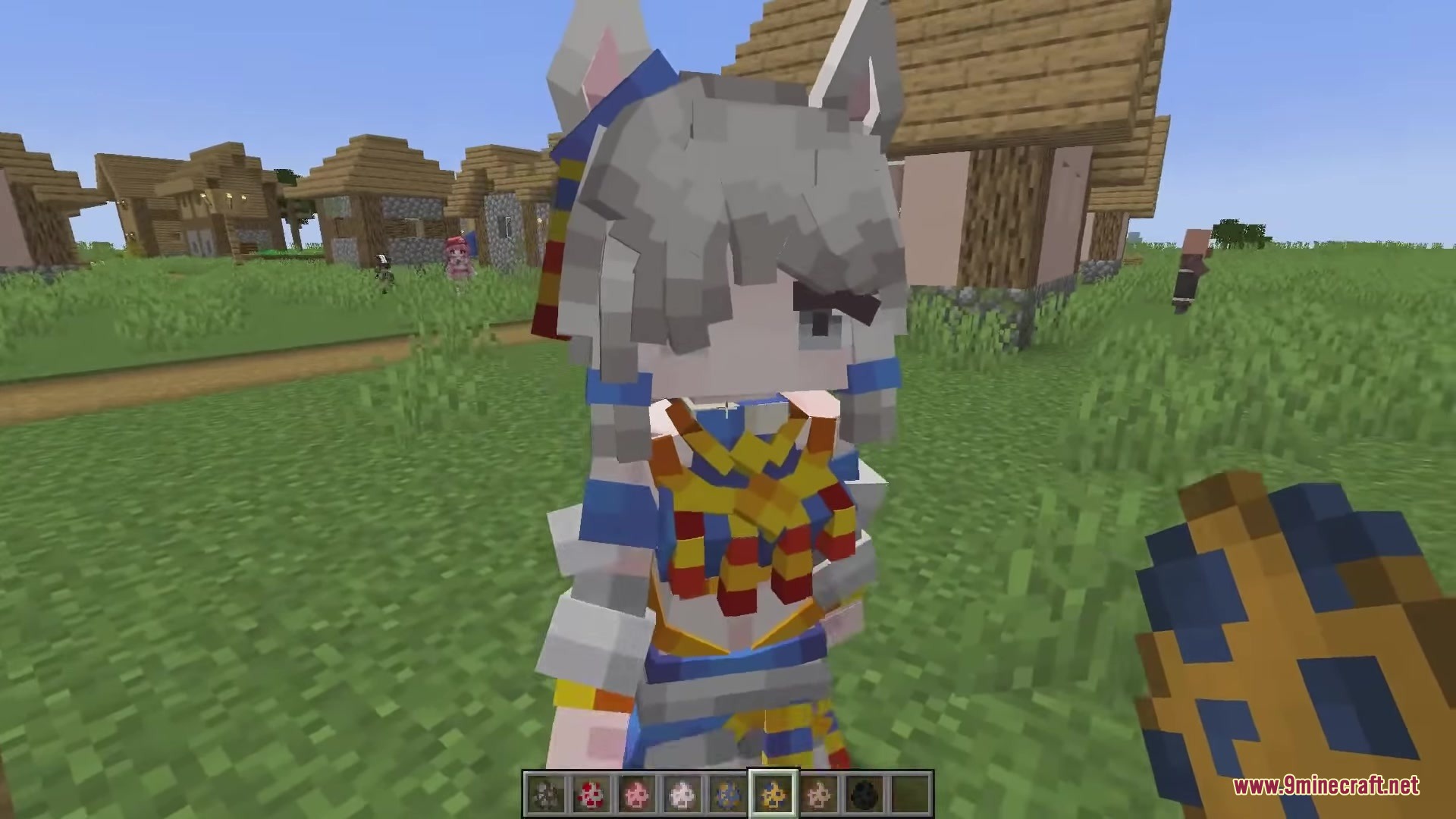 Dokimobs Mod Screenshot 6 A grey haired cat girl mob standing in a grassy Minecraft field