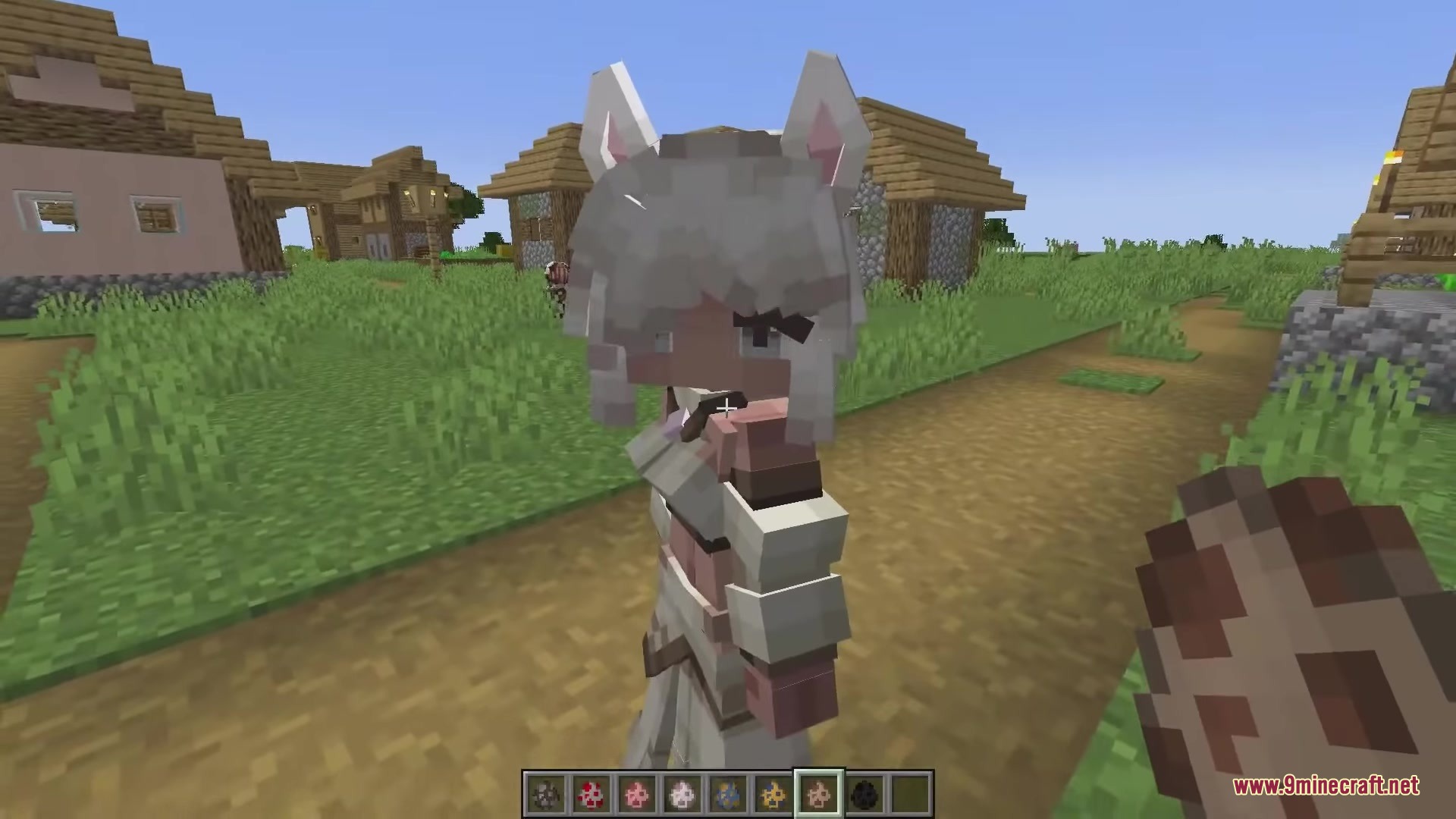 Dokimobs Mod Screenshot 7 A white haired wolf girl mob from Dokimobs Mod standing in a village