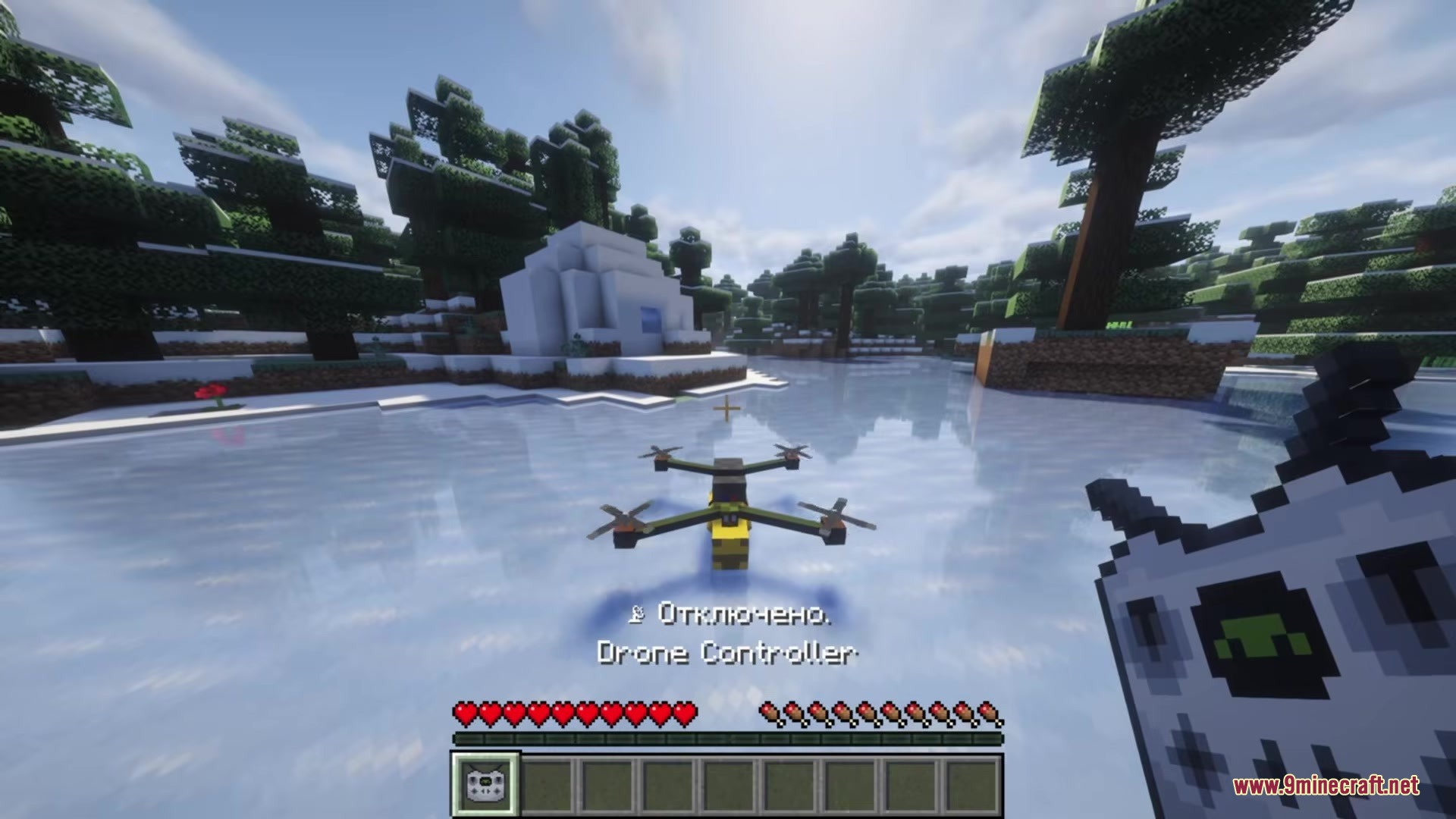 Drone FPV Mod Screenshot 5 Player holding a controller while using the Drone FPV Mod in Minecraft