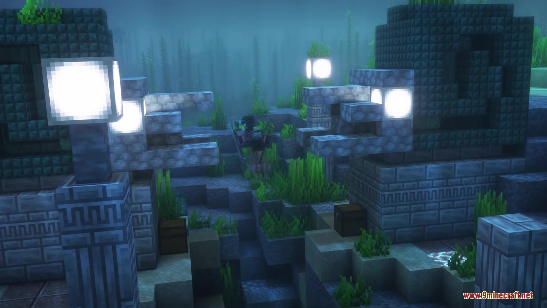 A Conduit Monument featuring glowing lanterns and stone pillars deep underwater