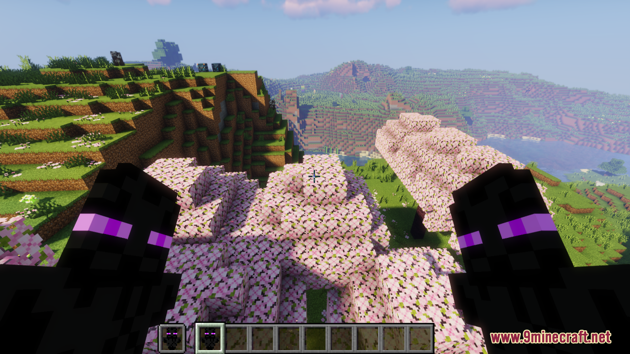 Enderman Totem of Undying Resource Pack Screenshot 1 Player holding Enderman Totem of Undying items in a cherry blossom biome