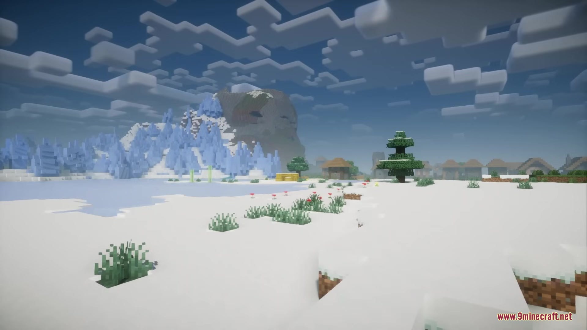 Enhanced Audio Ambience Sound Pack Resource Pack Screenshot 3 A snowy landscape with a frozen lake and mountains under a cloudy sky