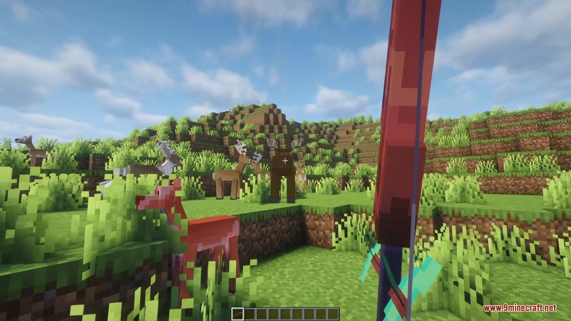 Epic Hunt Medieval Animals and More Mod Screenshot 2 Player aiming a bow at wild deer and a moose in the forest