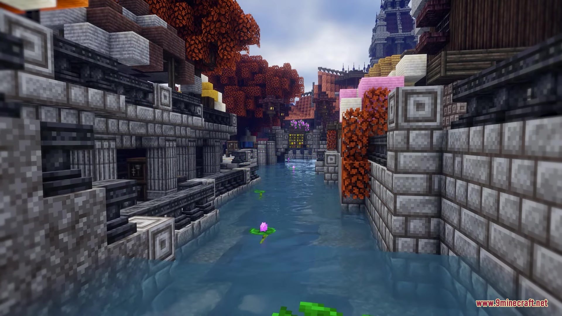 Excalibur Fresh Animations Patch Resource Pack Screenshot 4 A narrow canal flows between stone walls and medieval buildings under autumn trees