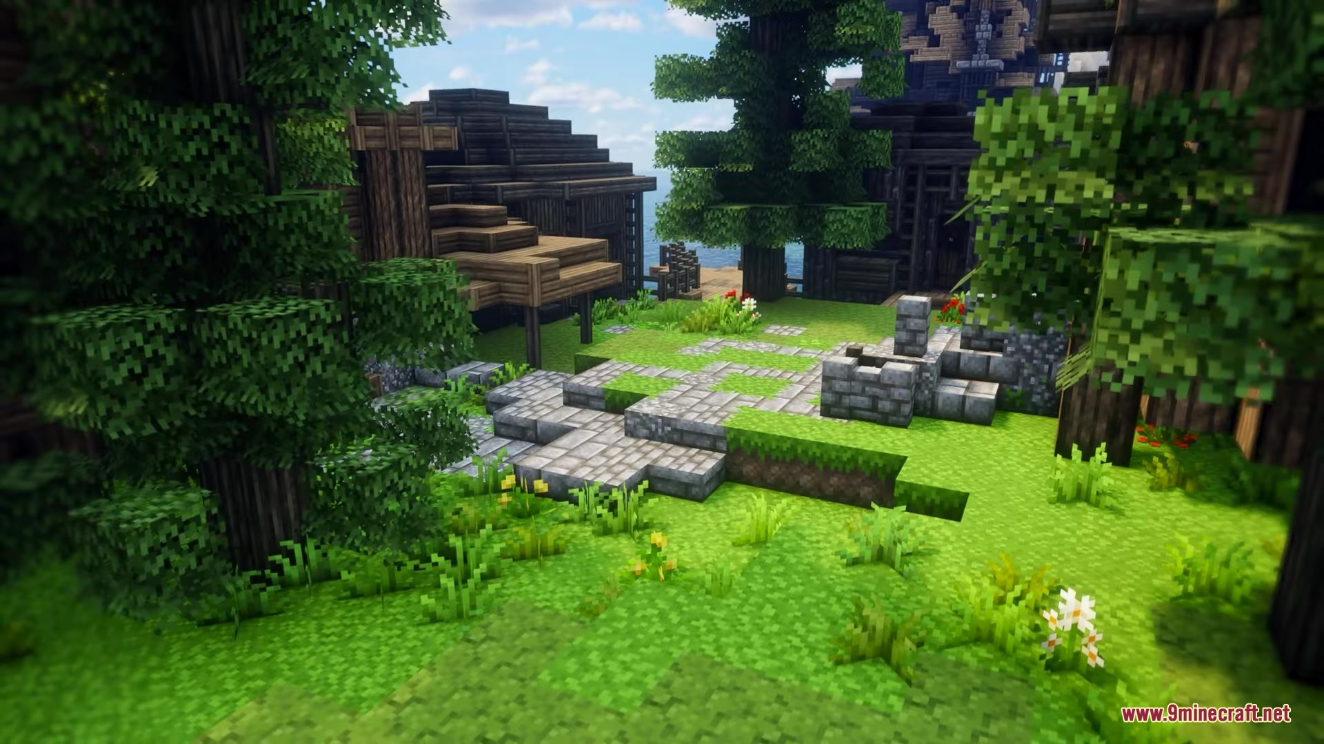 Excalibur Fresh Animations Patch Resource Pack Screenshot 7 Medieval wooden buildings surrounded by lush green grass and stone pathways