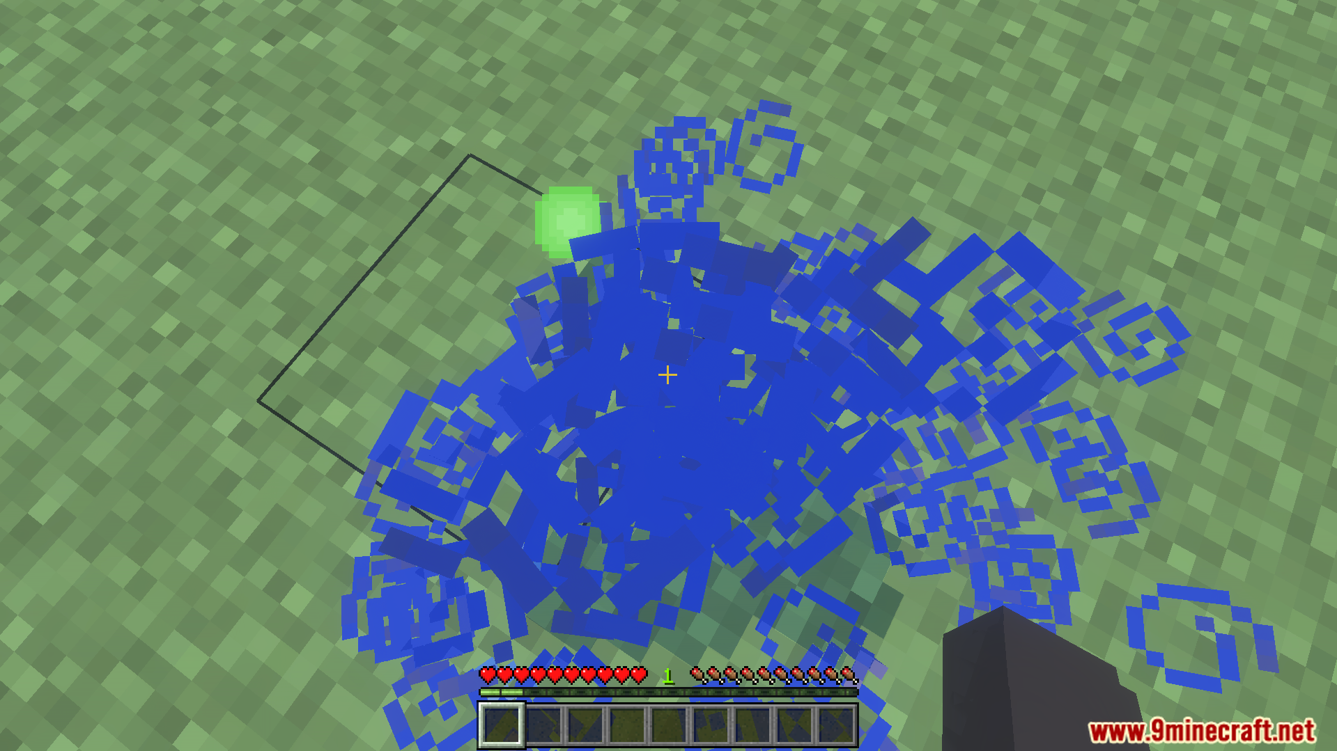 Extra XP Addon Screenshot 4 Player standing over blue particles and a green experience orb on grass