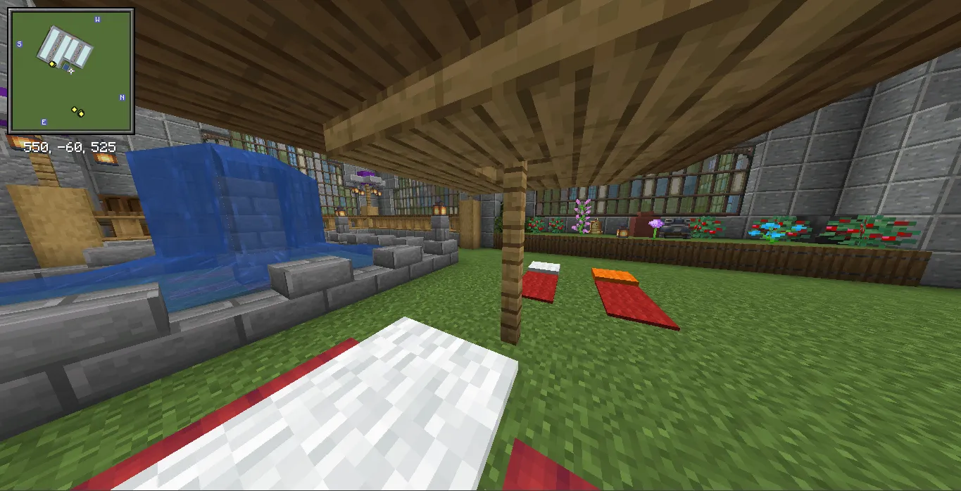 Factory Adg Schematic Screenshots 8 A stone fountain and wooden umbrella inside a garden courtyard of the factory
