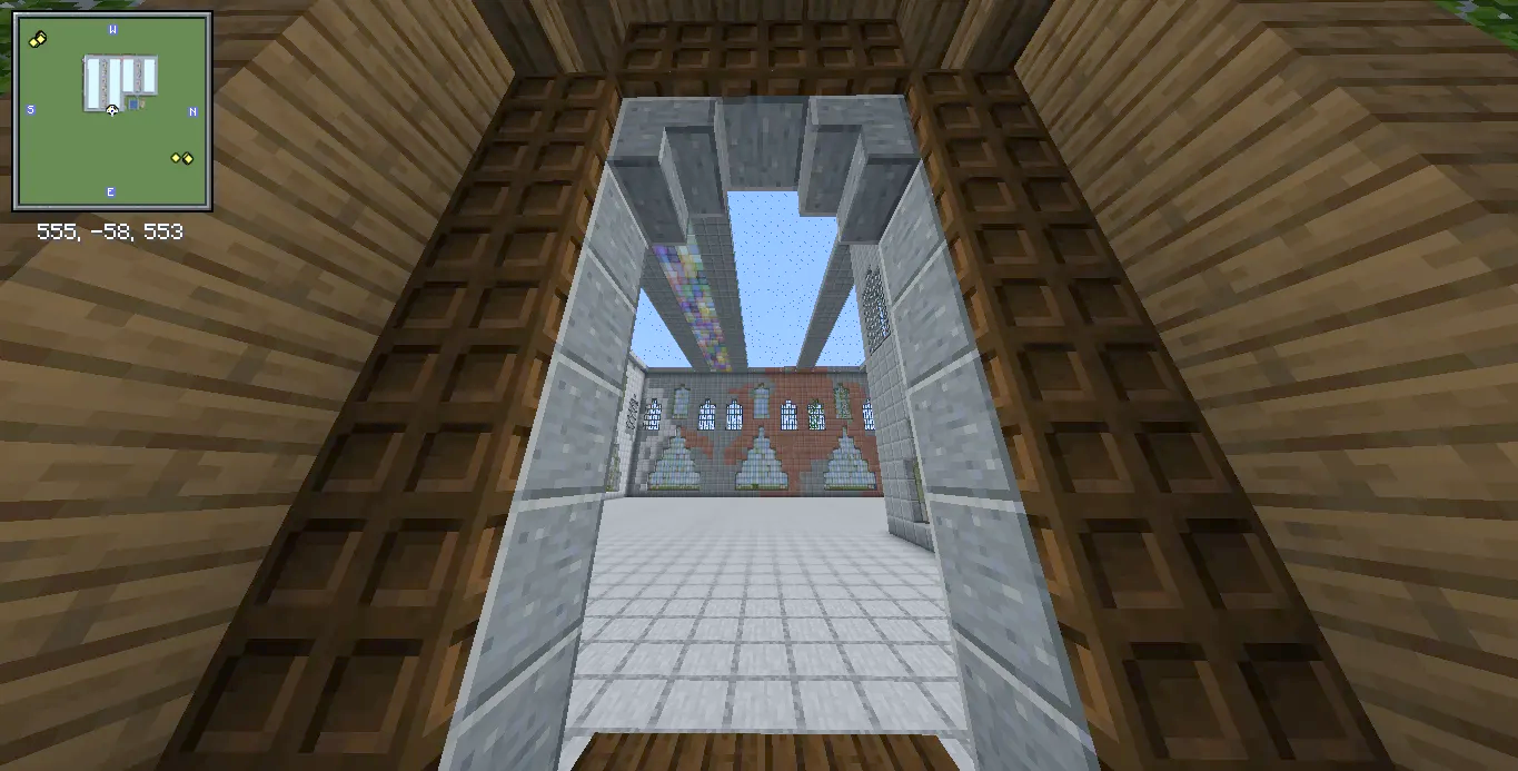Factory Adg Schematic Screenshots 9 Looking through a stone archway into a large factory with white tiled floors