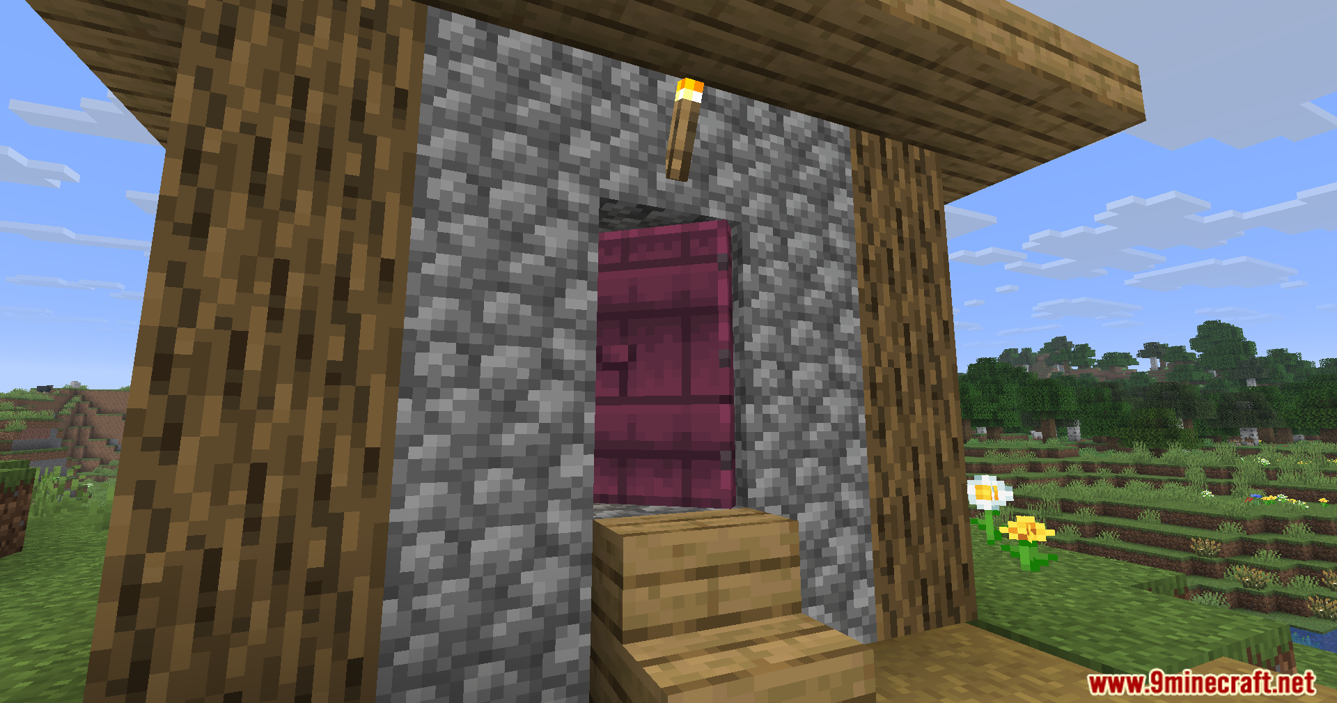 Fancy Door Animations Mod Screenshot 13 A crimson door installed in a cobblestone wall with oak wood accents