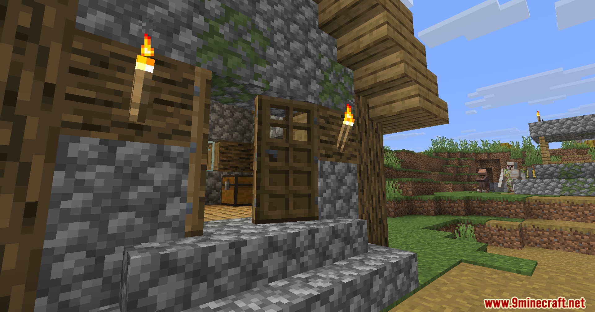 Fancy Door Animations Mod Screenshot 2 A wooden door swinging open with a smooth animation on a cobblestone house