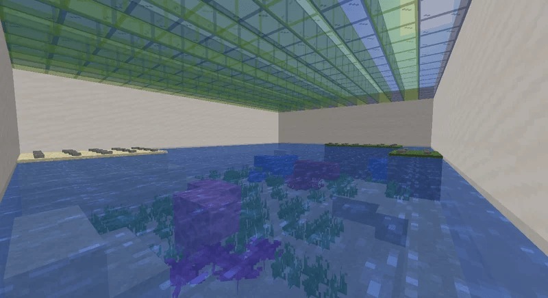 Underwater area with bright coral reefs and sea grass in a themed room