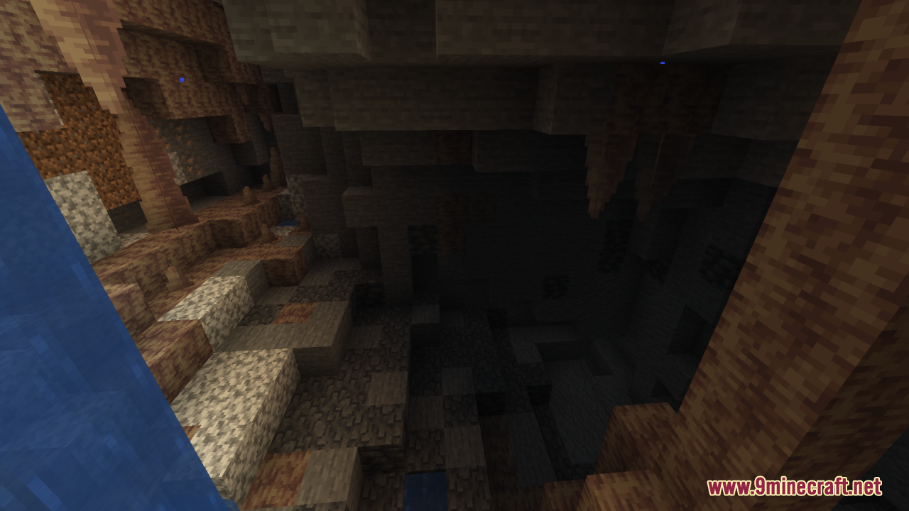 A dark Minecraft cave with a waterfall and sharp stalactites