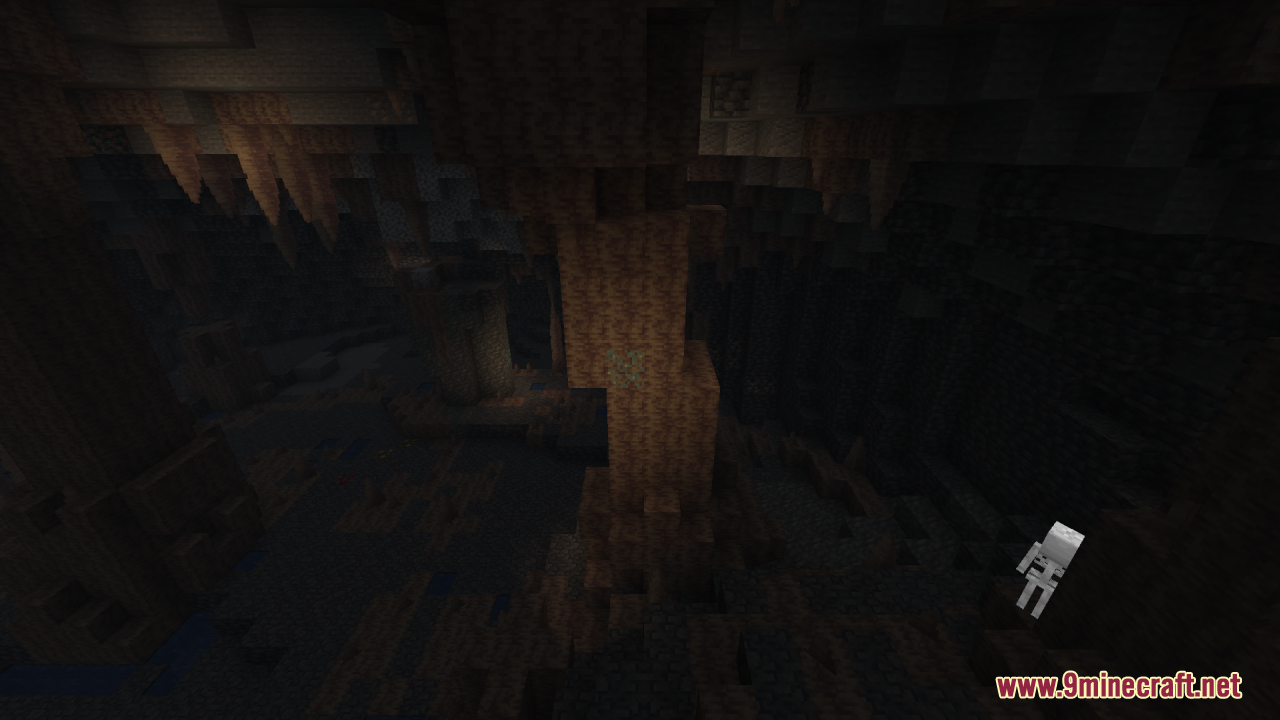 A dark Minecraft cave filled with stalactites and a skeleton mob