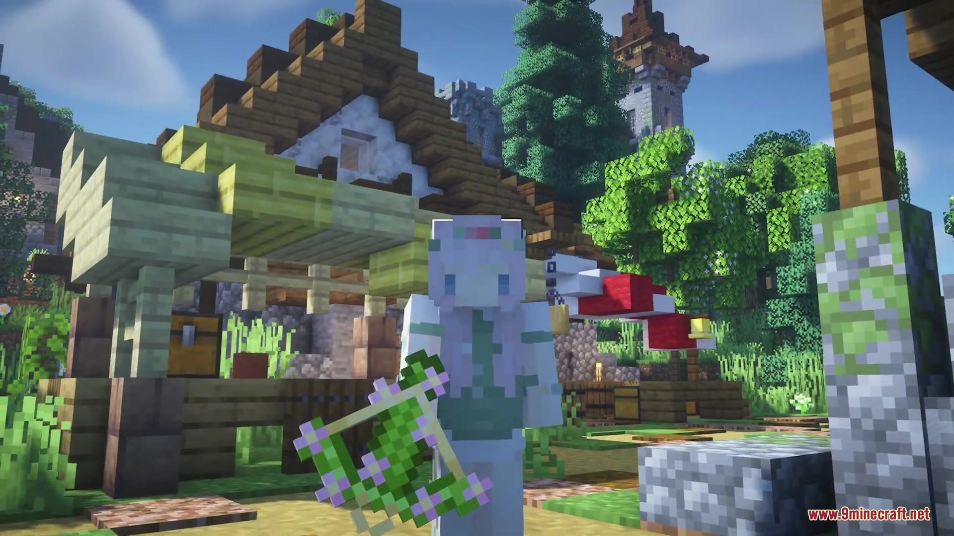 Player showcasing a flowering oak leaf block in front of a wooden house