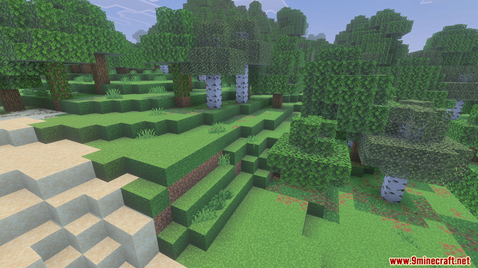 Full Grown Grass Texture Pack Screenshot 2 Lush forest landscape with grass blocks showing full side textures on hills