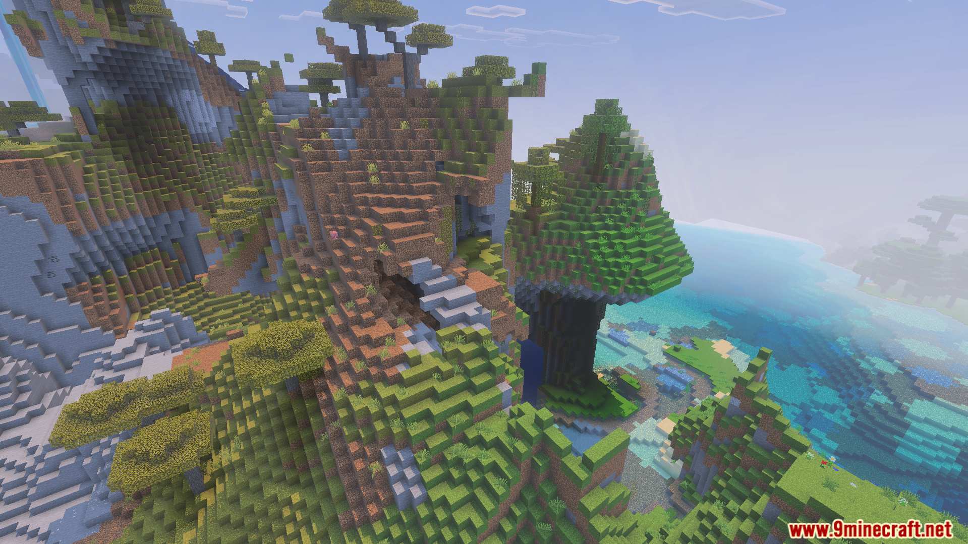 Full Grown Grass Texture Pack Screenshot 6 Lush green hills overlooking a vibrant coral reef in a Minecraft world