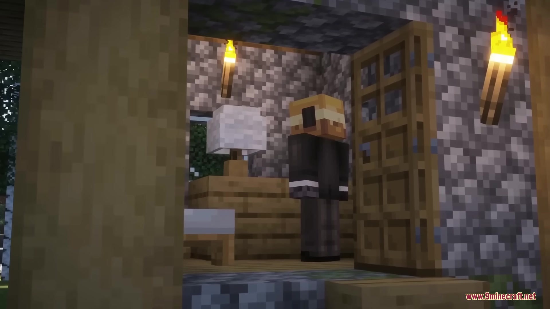 A player standing in a bedroom with a lamp and wooden furniture