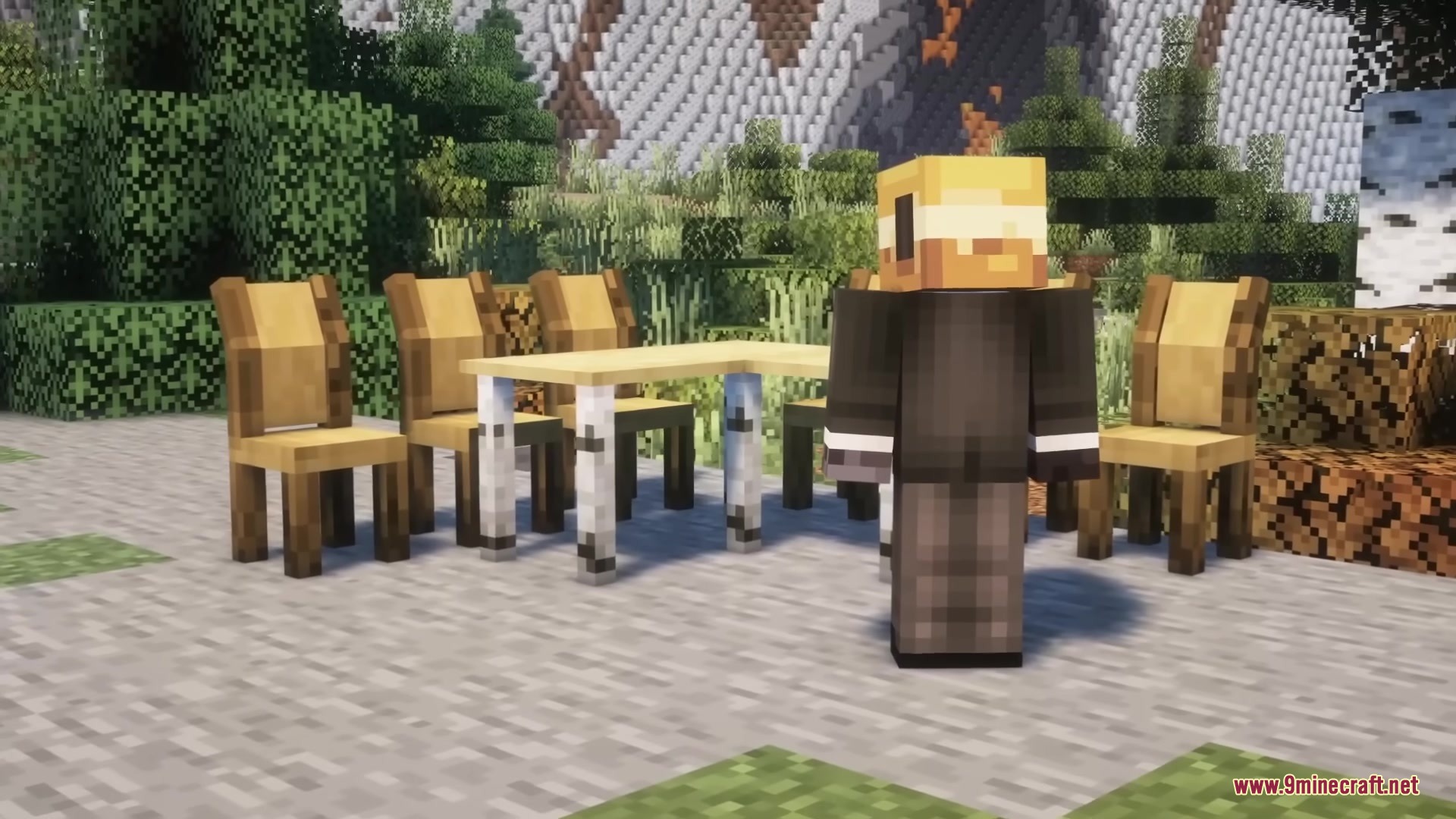 A Minecraft character standing next to a wooden table and chairs set