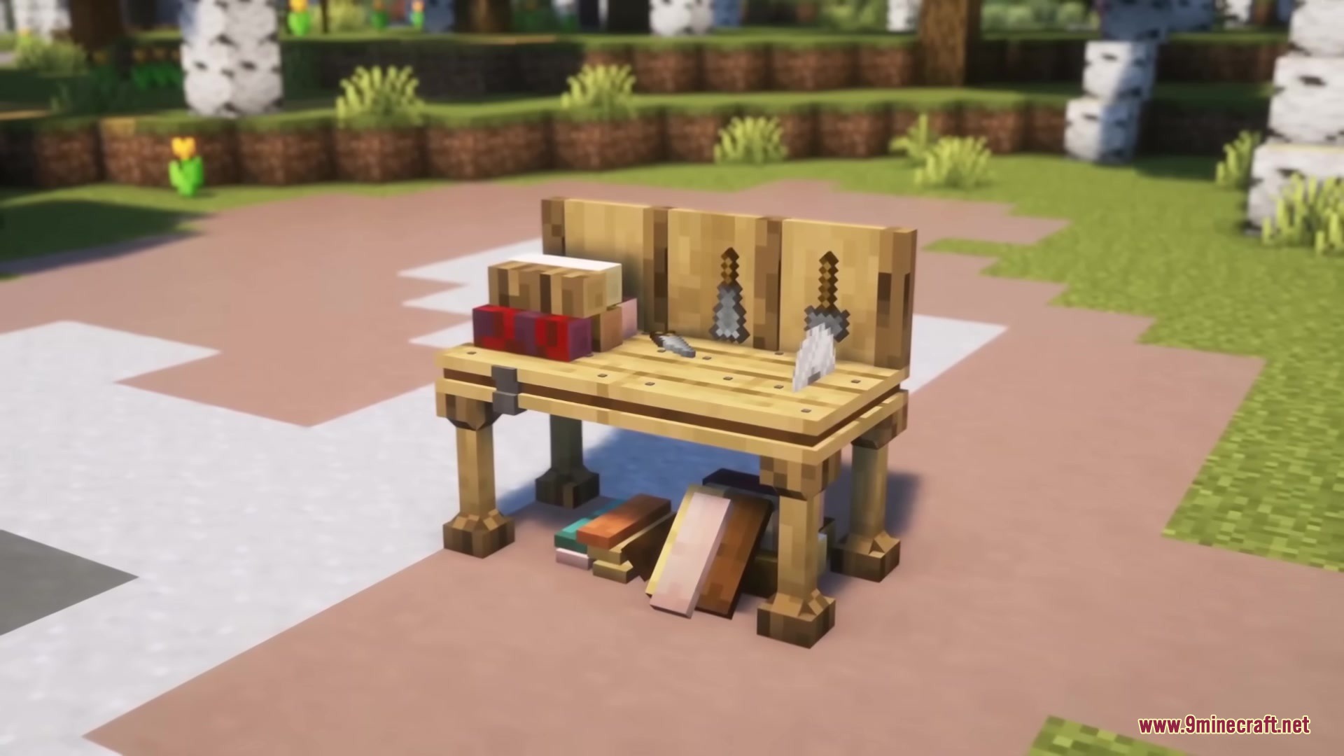 A wooden workbench with tools and books from the Furnection Mod