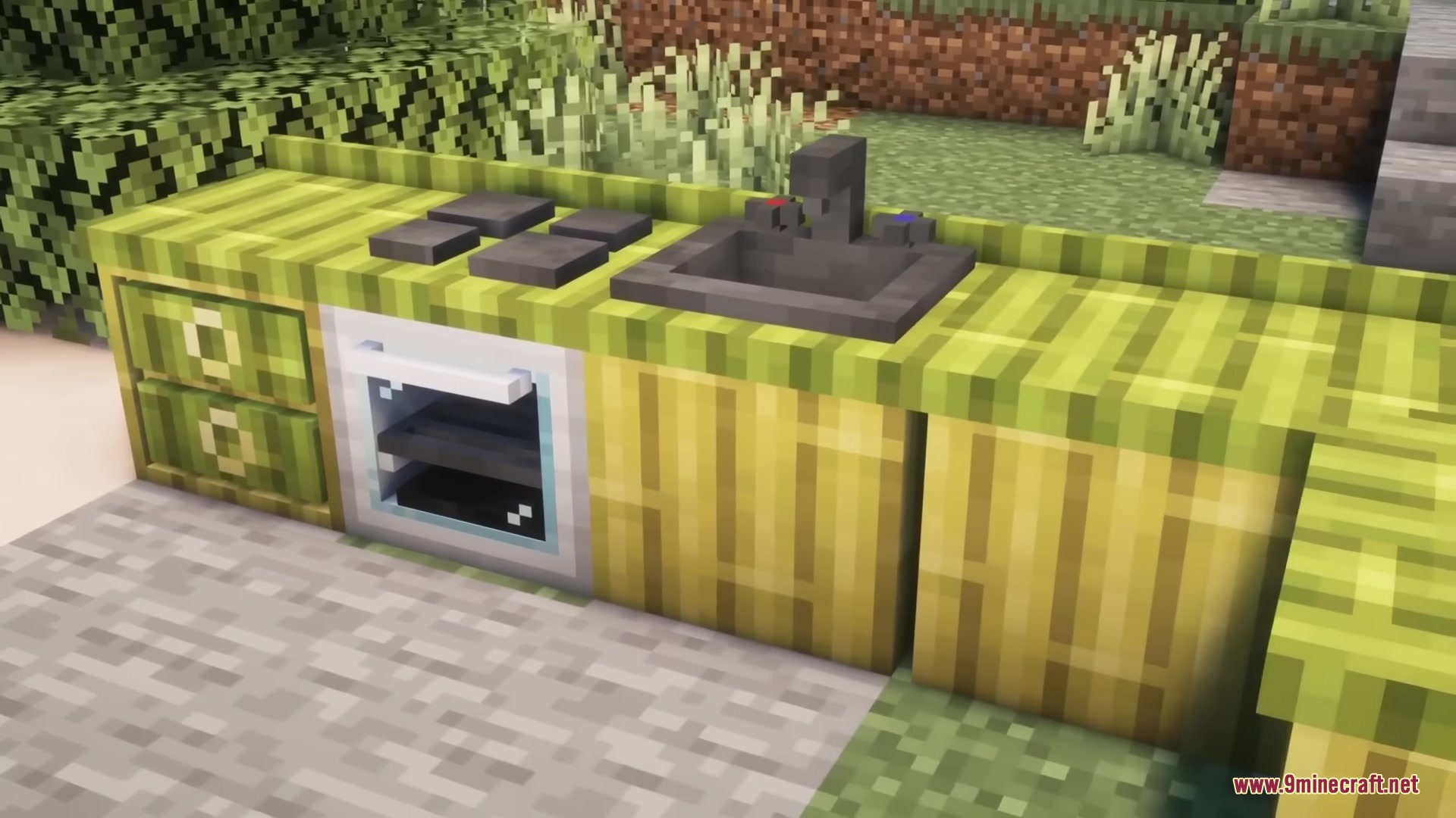 A bamboo kitchen counter with a sink and oven from Furnection Mod