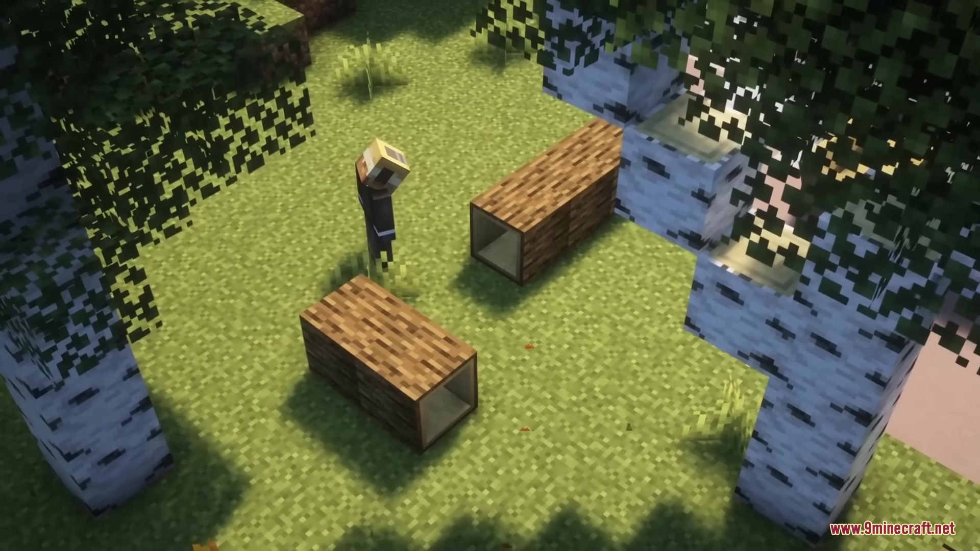 A character looks at hollow log furniture blocks on the grass in a forest