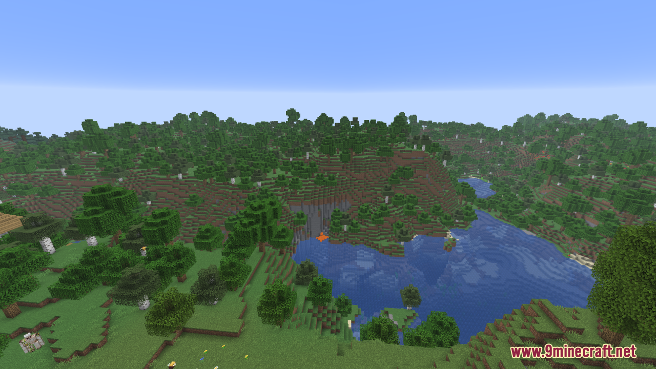 A bright forest landscape with a lake and many green trees