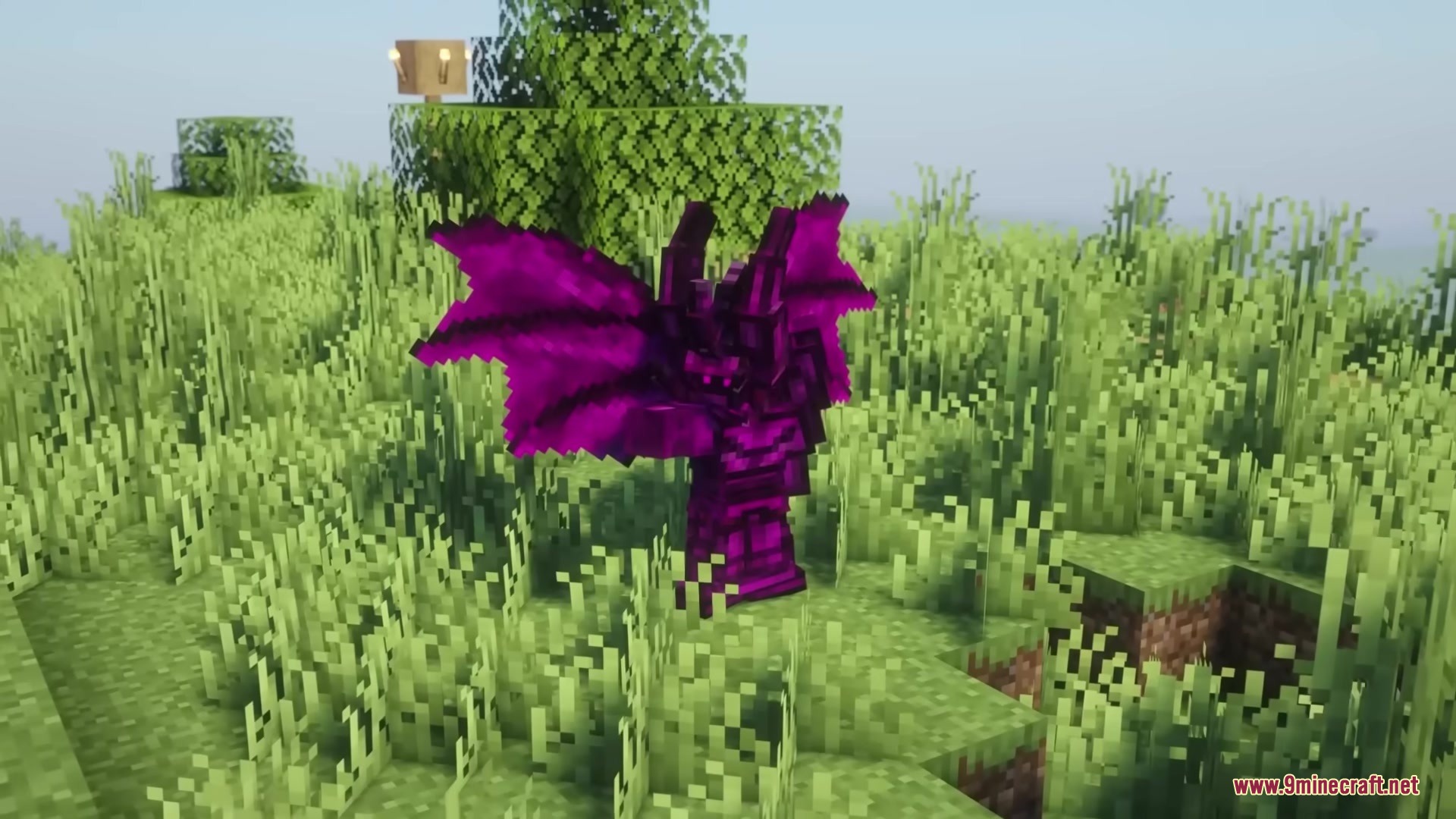 Gears of Glory Mod Screenshot 6 Minecraft character wearing purple winged armor standing in a grassy field