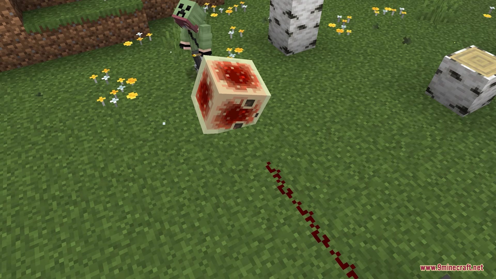 Get the Ball Rolling Mod Screenshot 2 A Sulphur Cube rolls across the grass leaving a red trail behind it