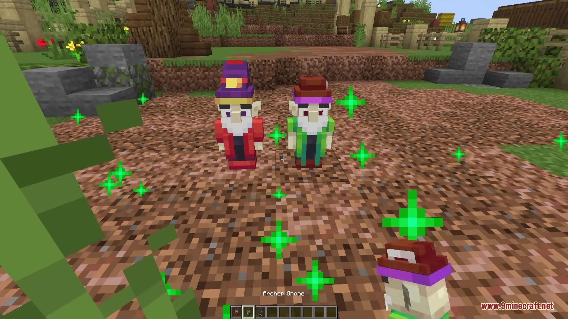 Gnyfty Gnomes Mod Screenshot 1 Two small gnome companions standing on dirt with green particles around them