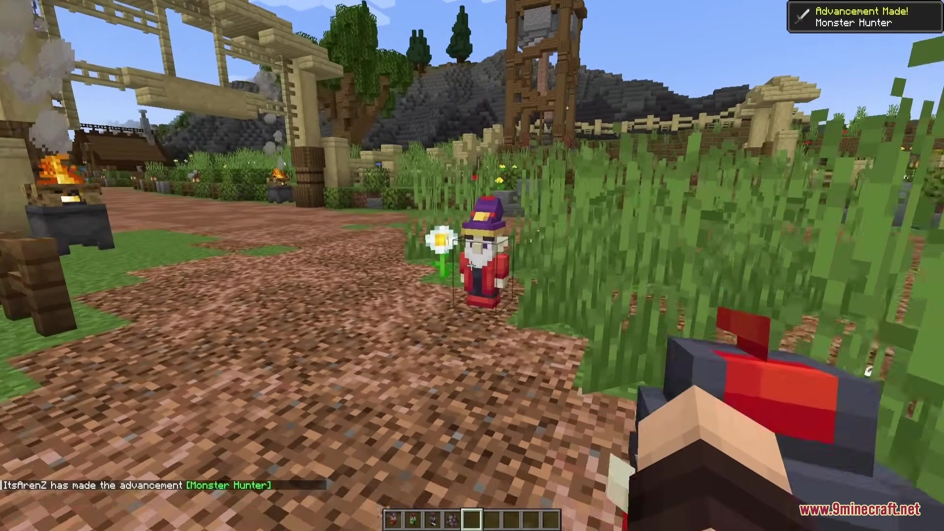 Gnyfty Gnomes Mod Screenshot 7 A small wizard gnome standing on a dirt path in a village
