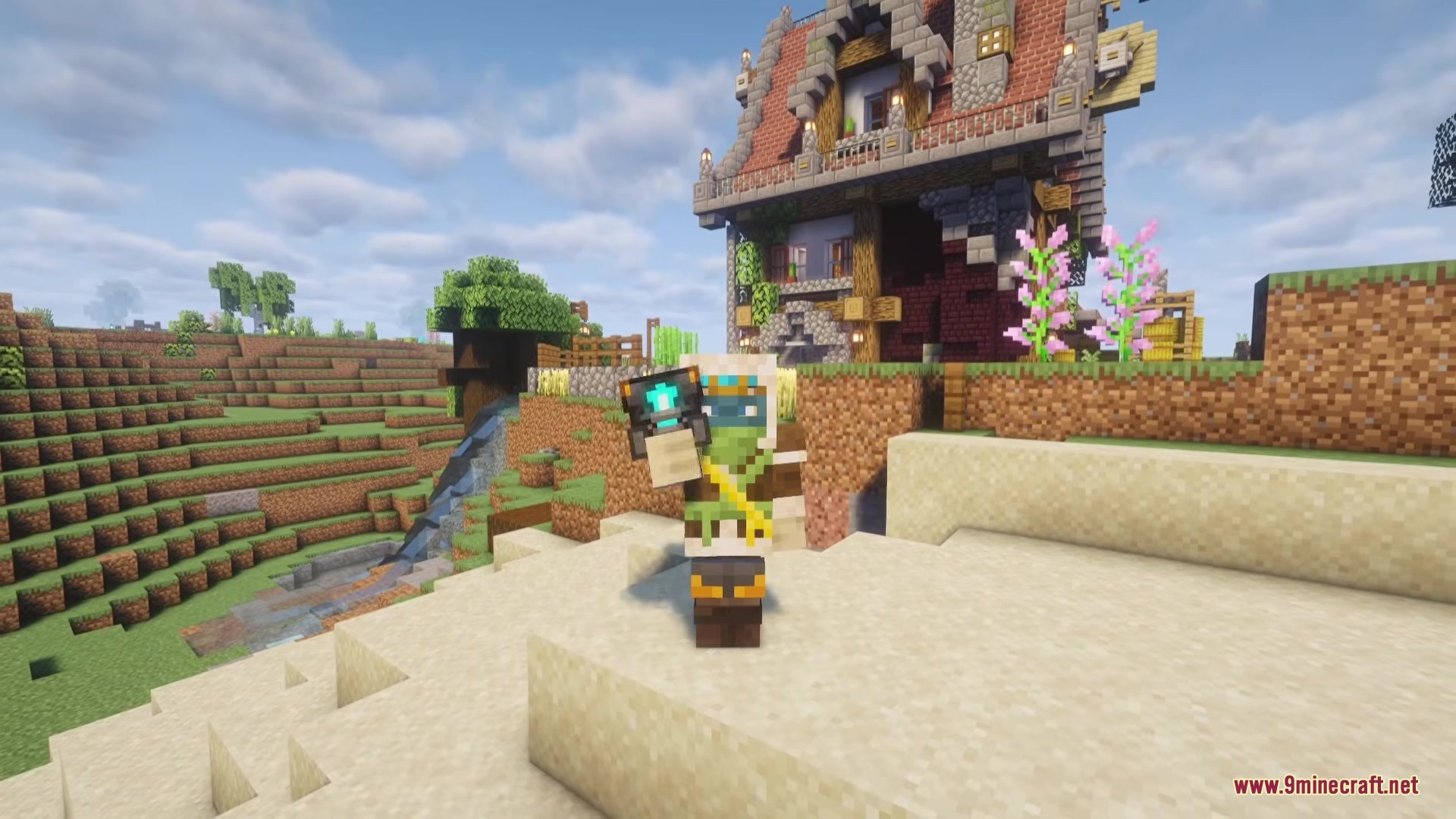 A player wearing white armor holds a glowing magical item near a house
