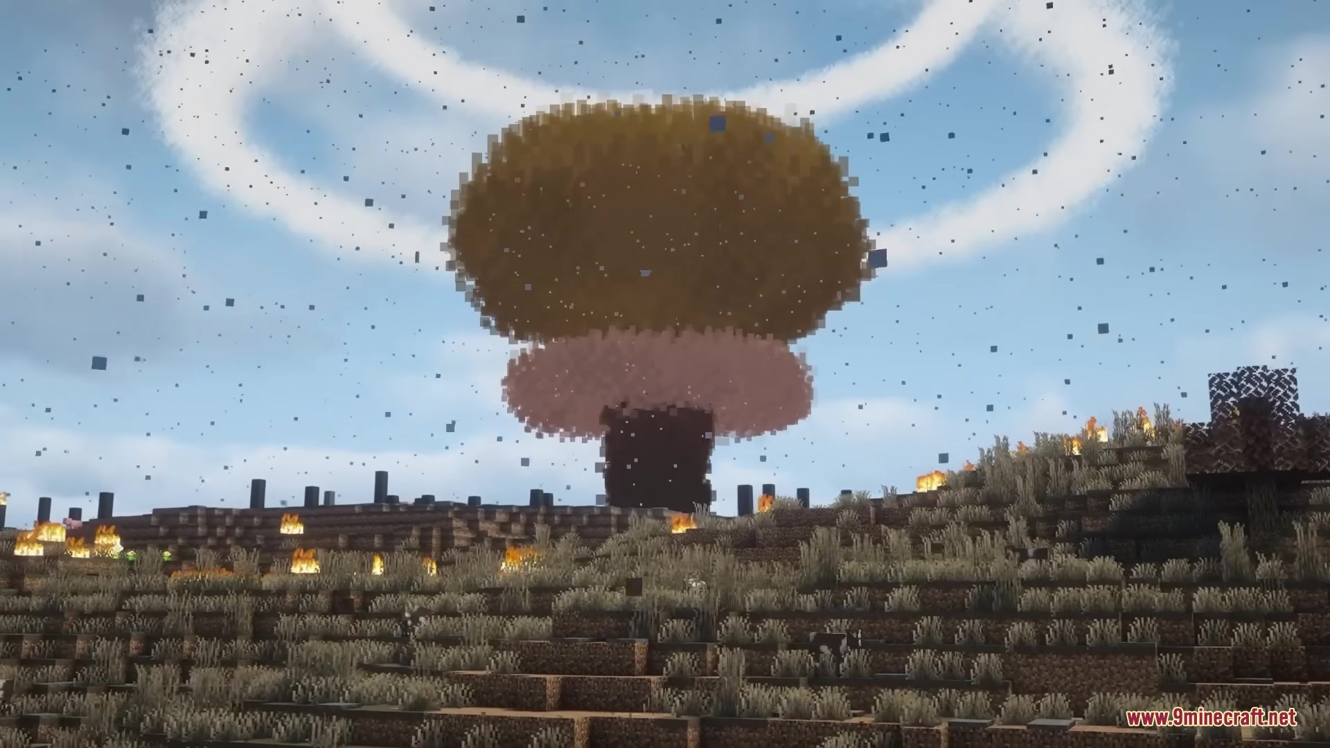 A giant mushroom cloud rises from a nuclear explosion in a Minecraft world